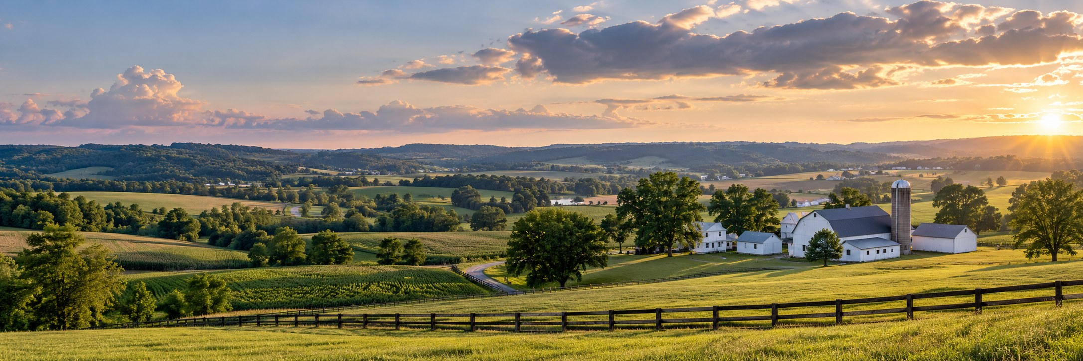 Panoramic rural Ohio countryside with rolling hills and farmland in golden sunlight